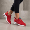 Red FJØRNA women's orthopedic sneakers with knit upper and arch support, perfect for summer comfort and casual wear.