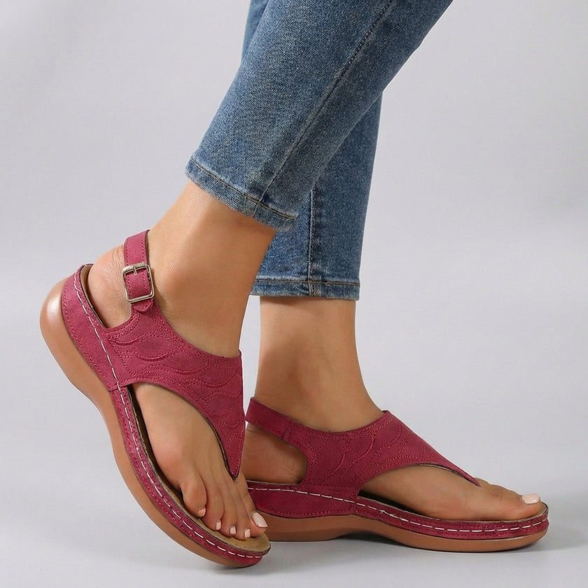 Red FJØRNA orthopedic embroidered wedge heel sandals with ankle strap and open toe, showcasing stylish footwear design.