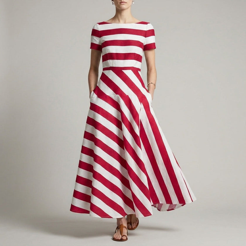 Red FJØRNA A-Line striped maxi dress with pockets for women, featuring a flowing design and bold stripe pattern.