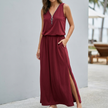Red FJØRNA relaxed fit sleeveless V-neck maxi dress for women, flowing fabric and ankle-length design, perfect for casual wear.