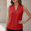 Red FJØRNA sleeveless V-neck blouse with front pleats, tailored fit, stylish women’s top perfect for casual or formal wear.