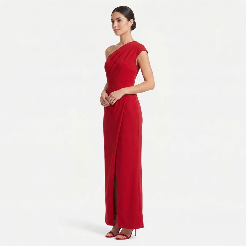 Red women's one-shoulder maxi evening dress by FJØRNA, featuring an asymmetric neckline and 3/4 side profile view.