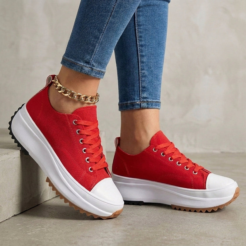 Red FJØRNA women's orthopedic lace-up sneakers with supportive design and cushioned soles for comfortable everyday wear.