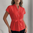Red FJØRNA summer blouse for women with cap sleeves, made of denim, stylish casual top for warm weather.