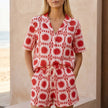 Red geometric high waist two-piece women's co-ord set by FJØRNA featuring a stylish, coordinated top and pants ensemble.