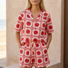 Red geometric high waist two-piece women's co-ord set by FJØRNA featuring a stylish, coordinated top and pants ensemble.