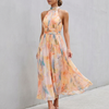 Reddish-orange pleated belted A-line halter neck maxi dress for women by FJØRNA, flowing fabric with a stylish silhouette.