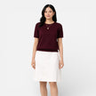 Red women's knit top by FJØRNA featuring a comfortable wool blend, classic fit, and stylish design.