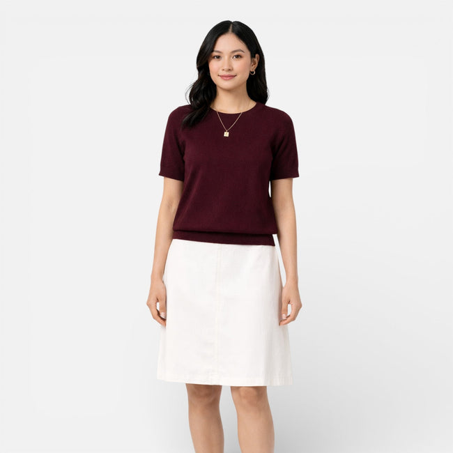 Red women's knit top by FJØRNA featuring a comfortable wool blend, classic fit, and stylish design.