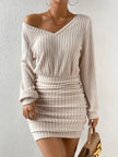 FJØRNA ribbed knit mini dress displayed on a model, showcasing its fitted silhouette and textured ribbed fabric.