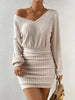 FJØRNA ribbed knit mini dress displayed on a model, showcasing its fitted silhouette and textured ribbed fabric.