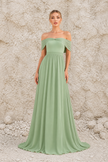 Sage green backless dress by FJØRNA, featuring a flowy silhouette and sleeveless design, shown from the back in the image.
