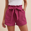 Rose pink summer linen shorts for women with high waist and pockets by FJØRNA, shown on a flat lay with natural fabric texture.