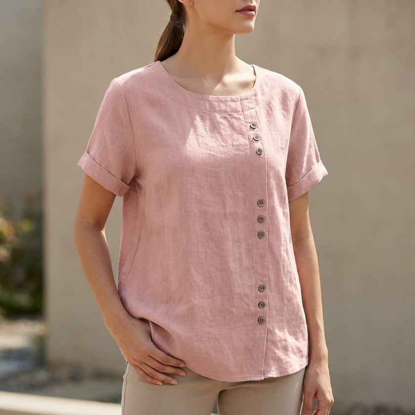 FJØRNA women's summer blouse with short sleeves and asymmetric design in light linen fabric, rose color, casual top for warm weather.
