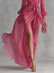 Rose pink chiffon V-neck evening dress by FJØRNA, flowing fabric with elegant drape and V-shaped neckline.