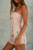 FJØRNA strapless floral mini dress for women with embroidered floral design and pleated fitted silhouette, perfect for summer.
