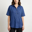 Royal blue short sleeve denim summer blouse for women by FJØRNA, featuring a casual, stylish fit and classic denim fabric.