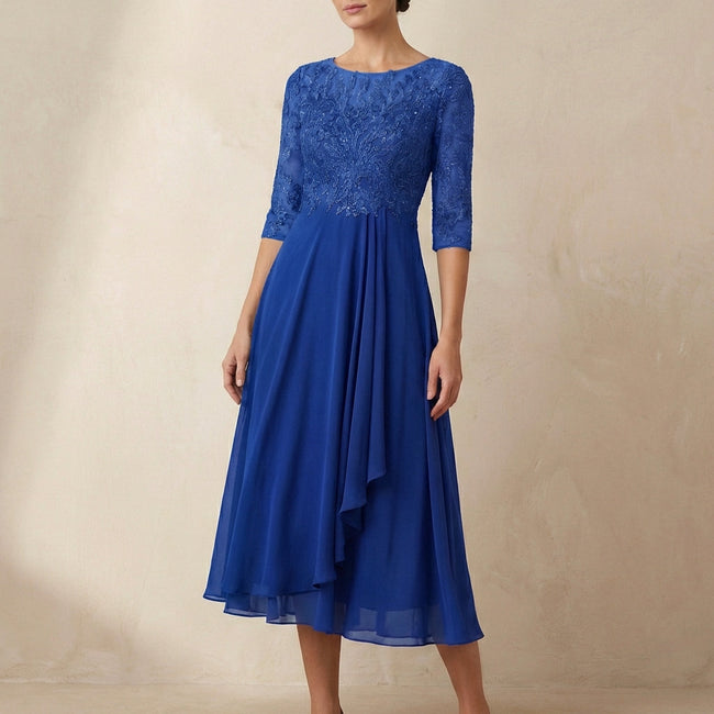 Royal blue FJØRNA elegant midi bodycon chiffon dress for women, showcasing a fitted silhouette and flowing fabric.