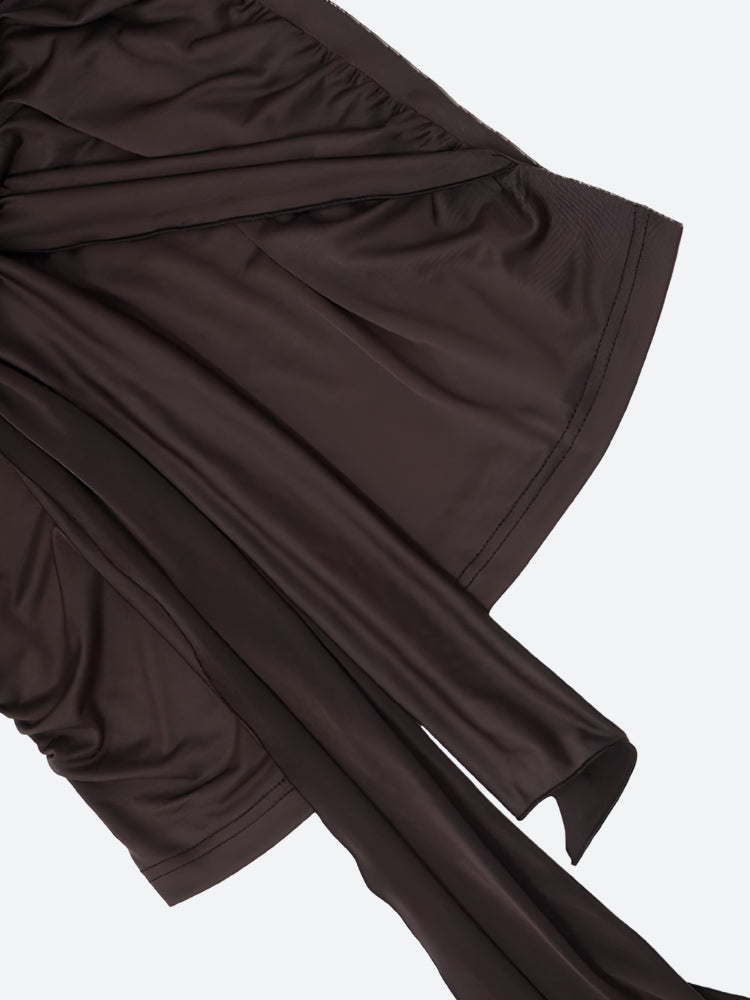 FJØRNA ruched halter neck mini dress displayed on a hanger, showcasing its fitted silhouette and stylish design.