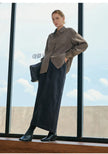 Women’s linen blend shirt by FJØRNA, casual tops with long sleeves and a relaxed fit, shown in soft neutral fabric.
