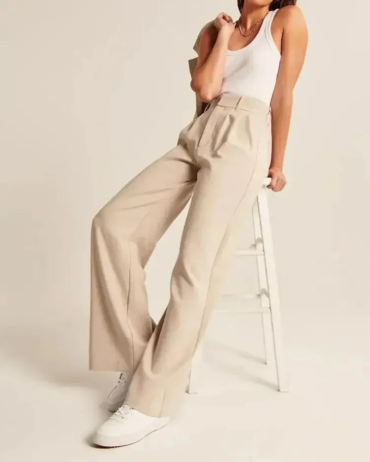 Wide-leg high-waist women's trousers by FJØRNA, showcasing a stylish, comfortable pant with a relaxed fit and elegant design.
