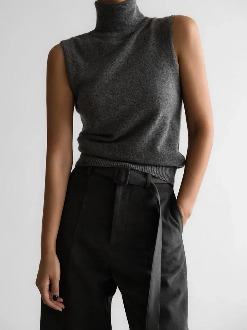 FJØRNA women's sleeveless wool vest, soft and cozy top, shown in a neutral color, ideal for layered winter or fall outfits.