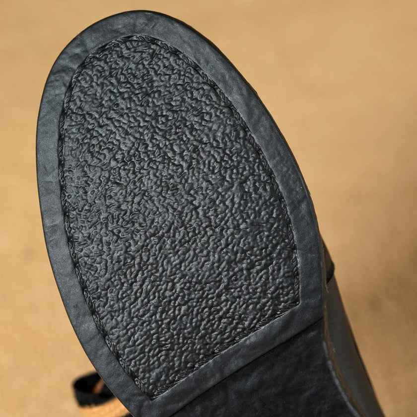 Handcrafted women's leather loafers by FJØRNA featuring cushioned insoles and a classic slip-on style.