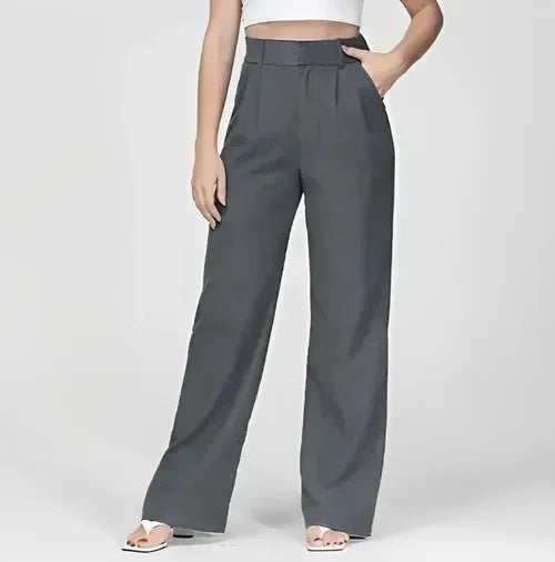 Women’s wide-leg high-waist trousers by FJØRNA, shown in a stylish, flowy design with a comfortable fit.