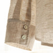 Extra-large linen shirt by FJØRNA with spacious pockets, featuring a relaxed fit and natural linen fabric in a stylish, casual design.