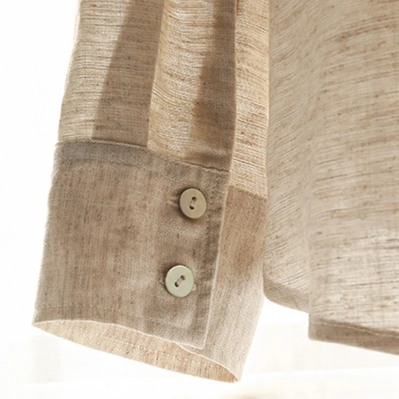 Extra-large linen shirt by FJØRNA with spacious pockets, featuring a relaxed fit and natural linen fabric in a stylish, casual design.