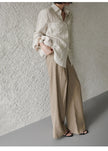 FJØRNA women's linen shirt with pleated design, lightweight and breathable top for a stylish, comfortable look.