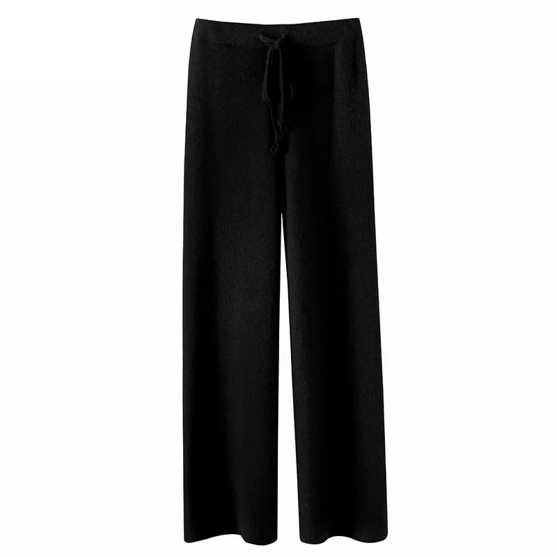 FJØRNA women’s joggers, stylish pants with a relaxed fit, featuring elastic waistband and tapered legs, suitable for casual wear.