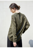 FJØRNA women's linen shirt, stylish lightweight top with a relaxed fit, shown in a soft linen fabric.