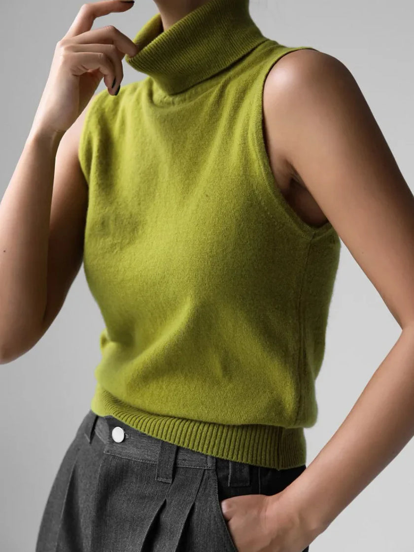FJØRNA women's sleeveless wool vest, soft and stylish top for women, shown in a neutral color, perfect for layered winter outfits.