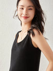 FJØRNA women's cashmere top in a soft, cozy fabric, featuring a relaxed fit with long sleeves and a classic neckline.