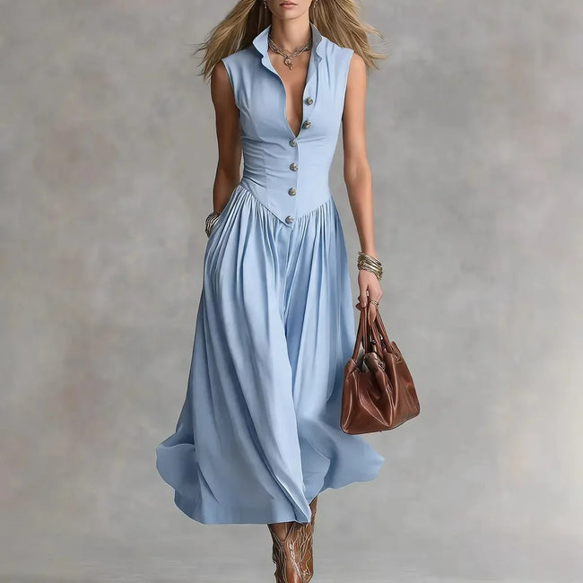 FJØRNA Martina elegant white flowy midi dress with a loose fit and soft fabric, perfect for sophisticated casual or evening wear.