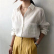 FJØRNA women's linen shirt with open collar, lightweight tops for women, casual yet stylish clothing for warm weather.