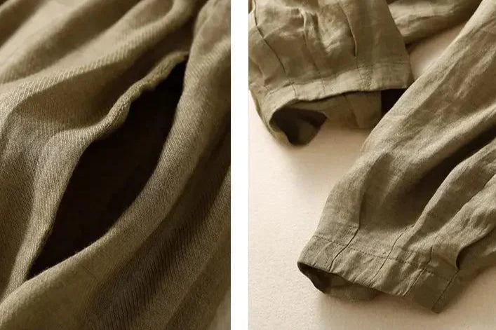 FJØRNA linen tapered trousers for women, showcasing lightweight, breathable fabric and relaxed fit in a natural pose.