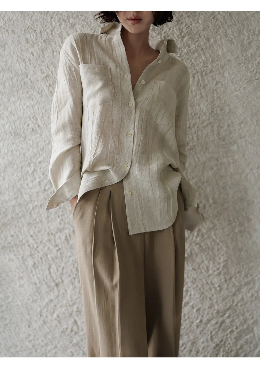 FJØRNA women's linen shirt with pleated design, lightweight tops featuring a relaxed fit and natural fabric for casual style.