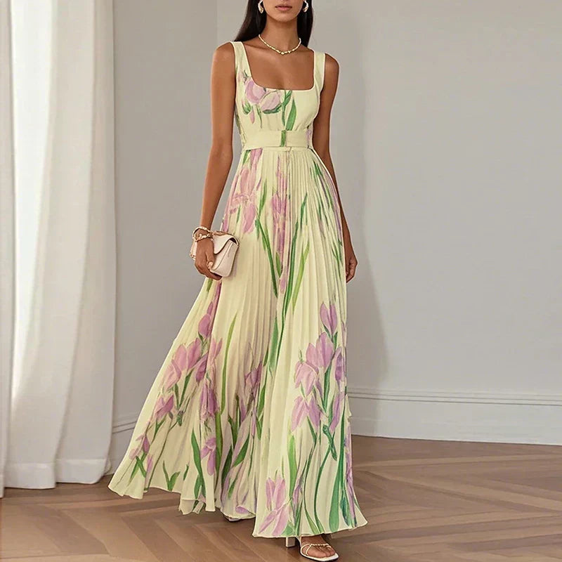 Elegant floral maxi dress for women by FJØRNA, featuring an A-line silhouette and flowing fabric, perfect for stylish occasions.