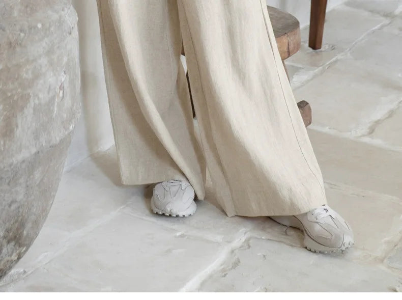FJØRNA women's linen wide-leg trousers with elastic waist and ruffle detail, casual and comfortable pants for women.