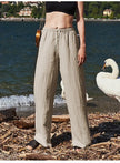 FJØRNA women's knit top featuring a soft, textured fabric with long sleeves and a relaxed fit, ideal for casual wear.