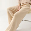Women’s Merino wool joggers by FJØRNA featuring wide-leg design and cozy knit fabric, perfect for casual comfort.