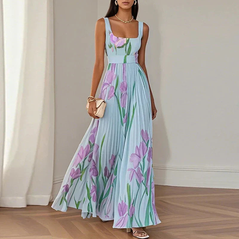 FJØRNA elegant floral maxi dress for women, A-line style with a flowing silhouette and vibrant floral pattern.