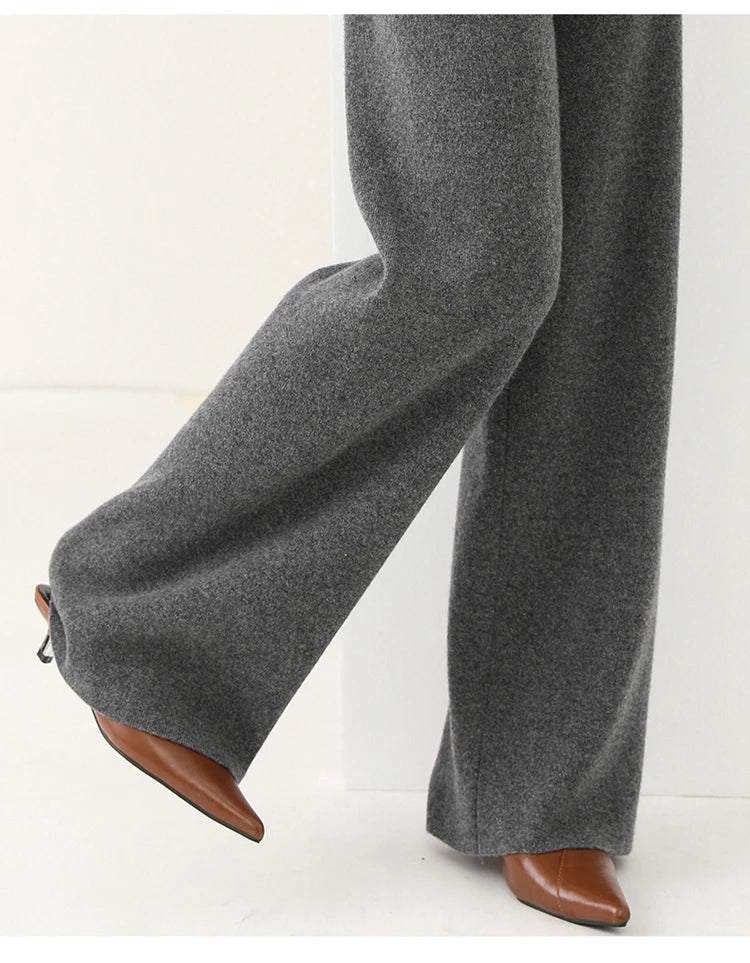 Women’s Merino wool joggers by FJØRNA with wide-leg design, soft knit fabric, and comfortable fit in natural wool material.
