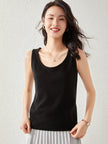 FJØRNA women's cashmere top, soft and cozy, featuring a classic fit and elegant design, perfect for stylish comfort.
