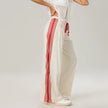 Women’s high waist cotton joggers by FJØRNA with elastic waistband, shown in a casual, relaxed fit style.