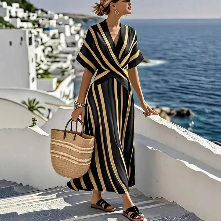 FJØRNA Carter summer elegant casual wedding dress with flowing fabric and sleeveless design, perfect for warm-weather occasions.
