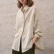 Extra-large linen shirt by FJØRNA featuring spacious pockets, lightweight and breathable fabric, shown on a model.