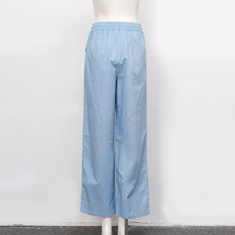 FJØRNA cotton linen wide-leg women's trousers with drawstring pull-on design, relaxed fit, and comfortable casual style.